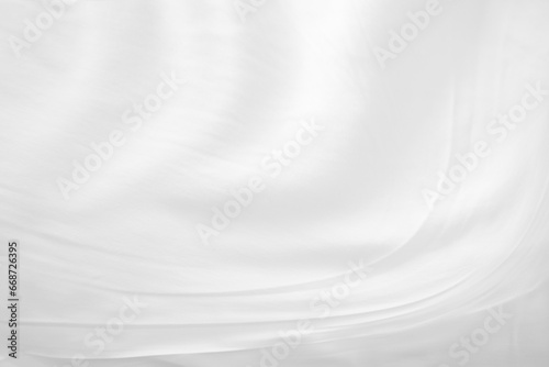 White cloth background abstract with soft waves.Abstract White Bedding Sheets or White wrinkled fabric background texture and Texture with copy-space :Creased or wrinkled white fabric,Soft focus