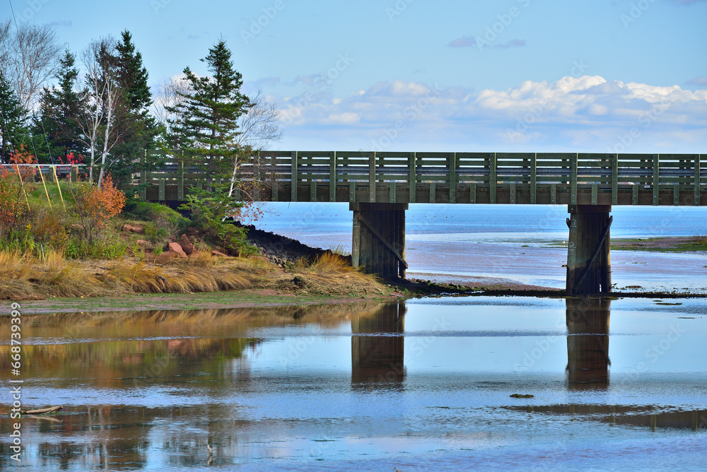 Fototapeta premium Bridge Over River in Fall