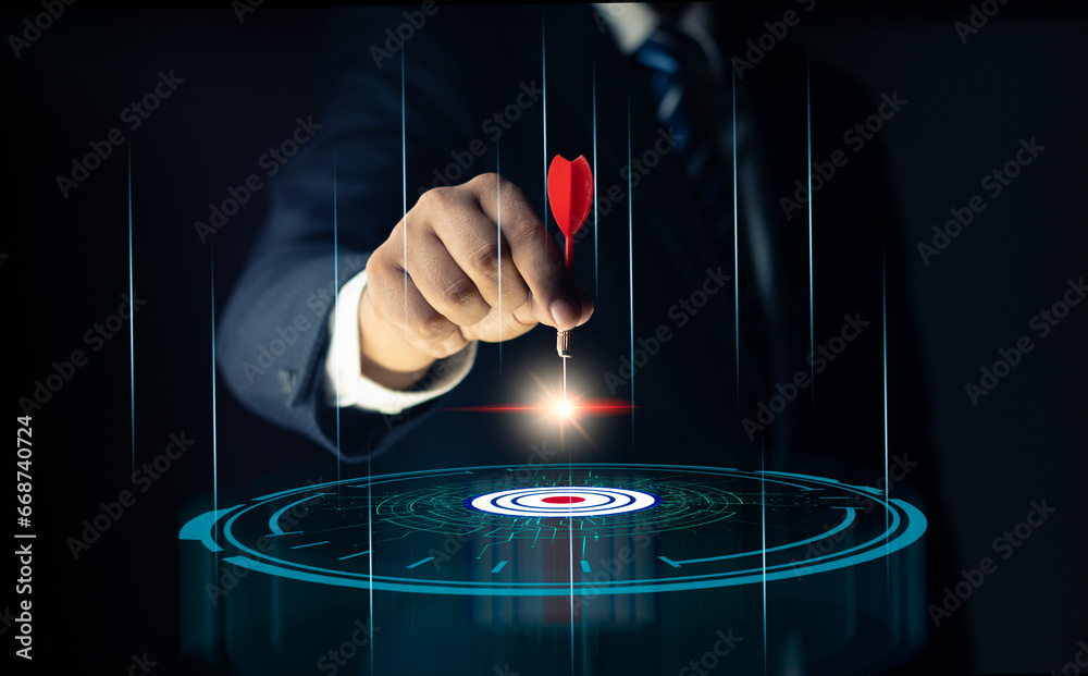 Concept of business strategy and future sustainable business finance action plan. Hand holding target board for creative and set up business objective target and success and business goals concept. - obrazy, fototapety, plakaty 