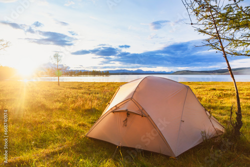 Wild camping by a lake photo