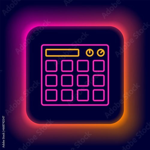 Glowing neon line Drum machine music producer equipment icon isolated on black background. Colorful outline concept. Vector