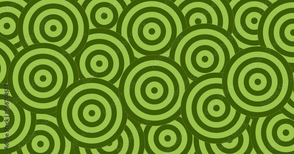 Small circular radiowave arranged and placed together to form a pattern grid. Multiple growing circle radiowave seamless looped motion graphics shape background. Green color background. Small circular radiowave arranged and placed together to form a pattern grid. Multiple growing circle radiowave seamless looped motion graphics shape background. Green color background.