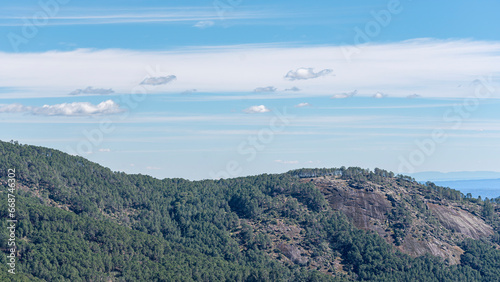 Mountain range panorama with clear blue skies in spring © EMILIA