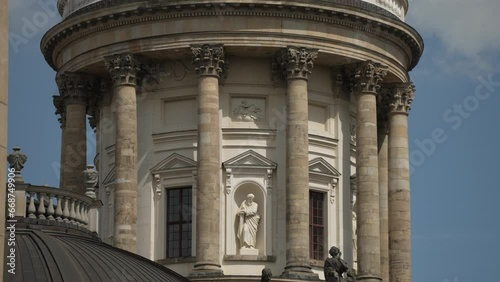 View of Franzosischer Dom (French Cathedral) dome against blue sky, Gendarmenmarkt, Berlin photo