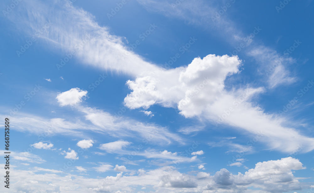Panoramic view of clear blue sky and clouds, Blue sky background with tiny clouds. White fluffy clouds in the blue sky. Captivating stock photo featuring the mesmerizing beauty of the sky and clouds. Panoramic view of clear blue sky and clouds, Blue sky background with tiny clouds. White fluffy clouds in the blue sky. Captivating stock photo featuring the mesmerizing beauty of the sky and clouds.