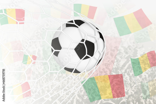 National Football team of Mali scored goal. Ball in goal net, while football supporters are waving the Mali flag in the background.