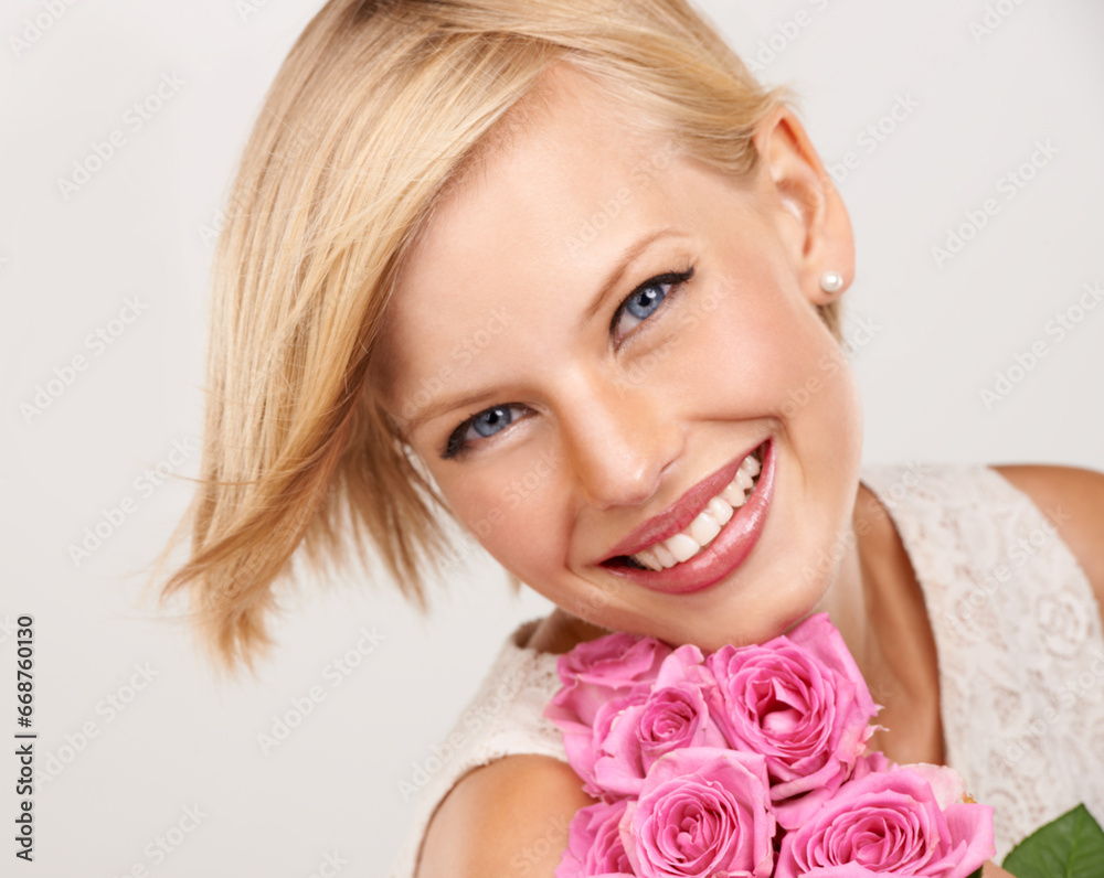 Rose, bouquet and flowers with portrait of woman in studio for floral, valentines day and romance. Plants, gift and happy with person and smile on white background for elegant, love and present Rose, bouquet and flowers with portrait of woman in studio for floral, valentines day and romance. Plants, gift and happy with person and smile on white background for elegant, love and present