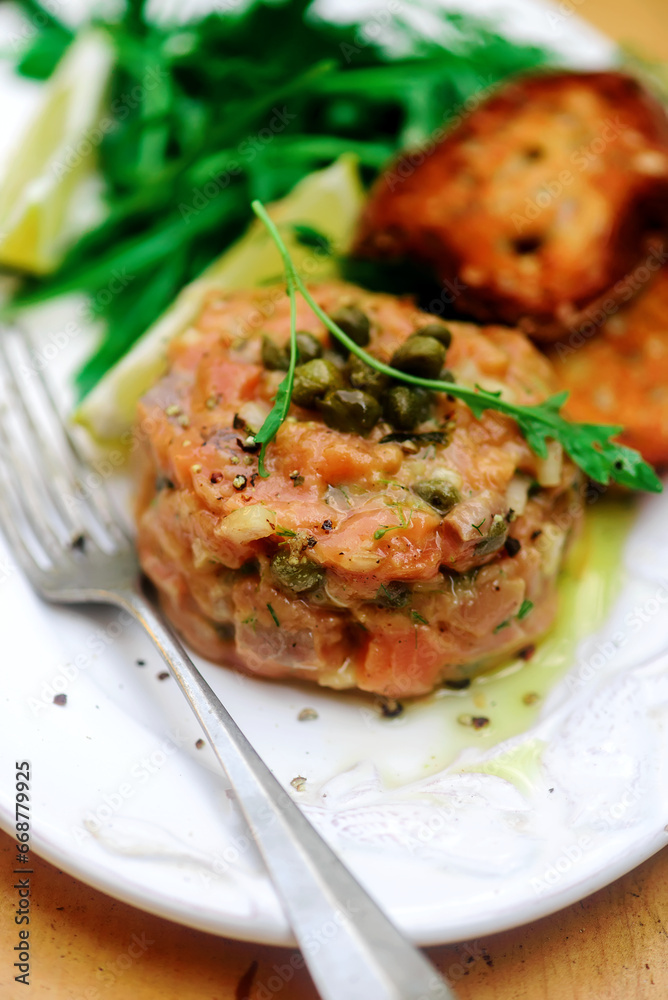 Salmon tartare ,toast with glass of wine