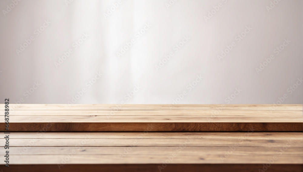 Empty wooden table in front with blurred white background Empty wooden table in front with blurred white background