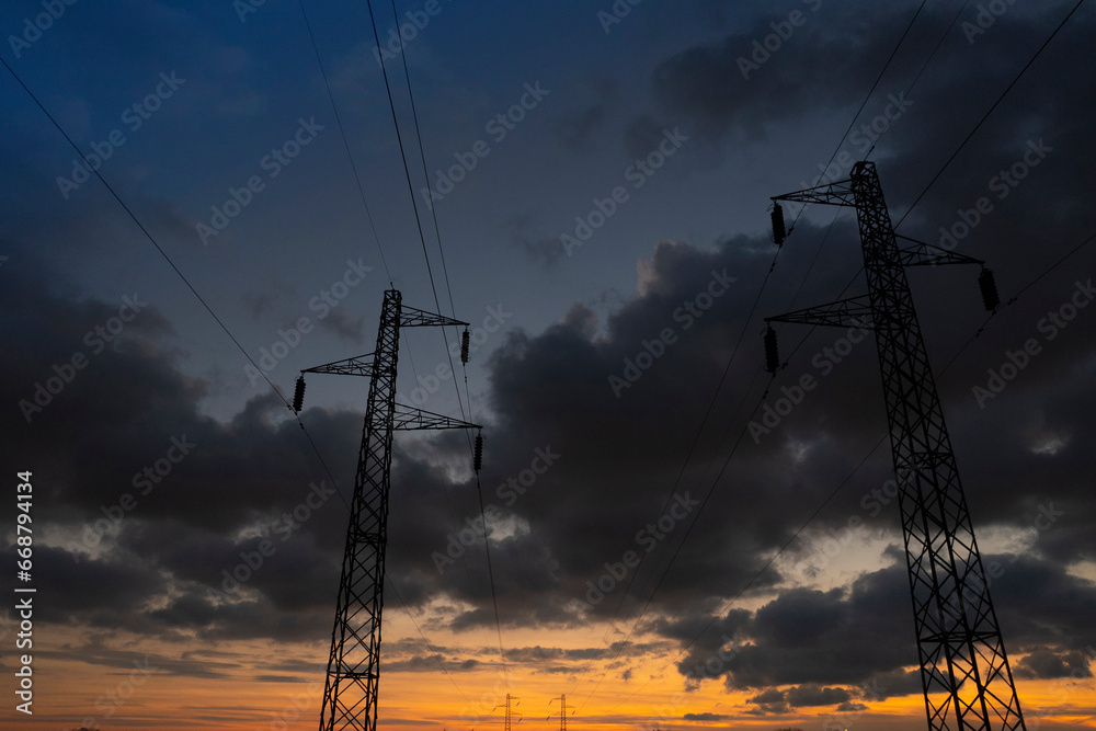 Pylons for the transport of electricity at sunset