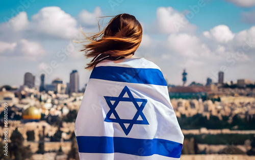 Woman wrapped with Israel flag photo