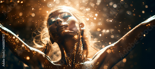 closeup Beautiful female model with golden glitter on her face in a party setting with elegant makeup