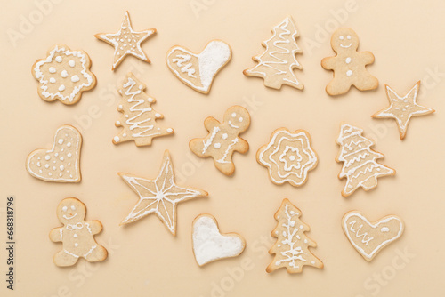 Cute homemade Christmas cookies on color background,top view