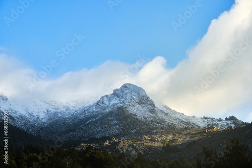 Mountain with the first snow at the beginning of winter. © roberjzm