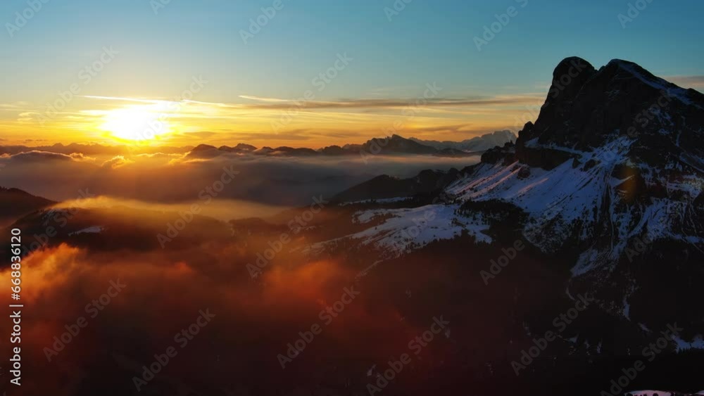Aerial view of amazing rocky mountains in snow and sunrise sun, Dolomites, Italy, 4k Aerial view of amazing rocky mountains in snow and sunrise sun, Dolomites, Italy, 4k