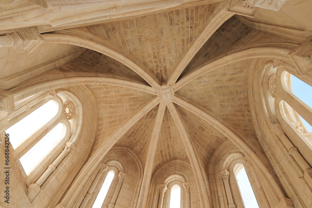 The interior of the historic Alcobasa Monastery with columns and arches in Portugal
