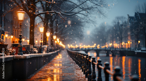 Amsterdam canal at night with lights and snowfall, Netherlands.
