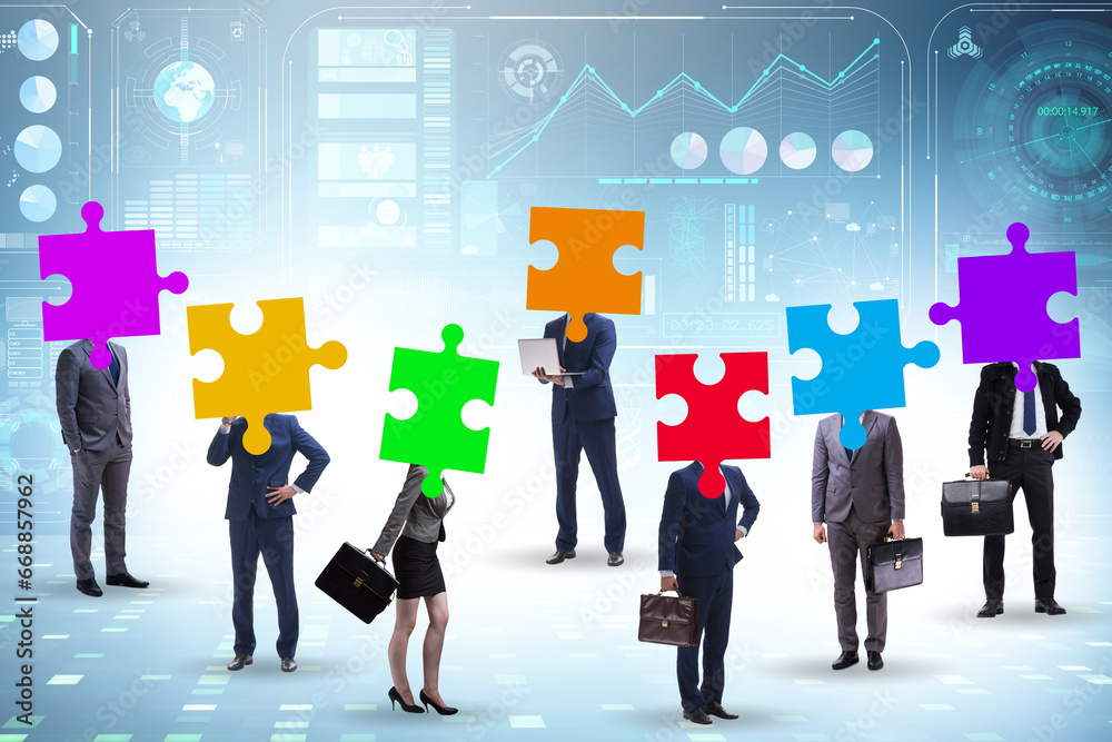 Concept of business people and jigsaw puzzle Concept of business people and jigsaw puzzle