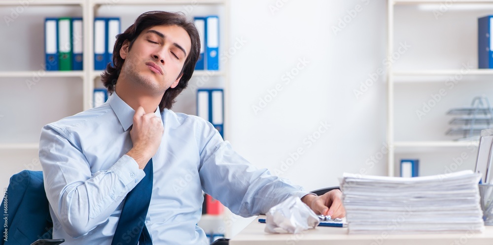 Businessman rejecting new ideas with lots of papers Businessman rejecting new ideas with lots of papers