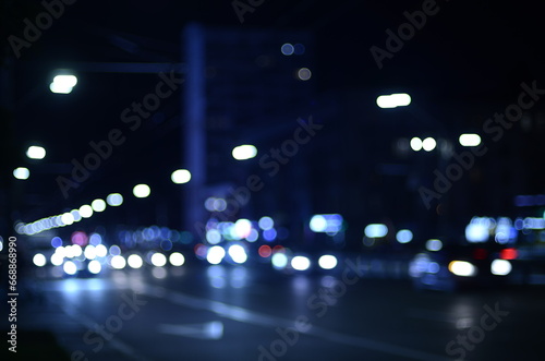 Blurred view of night city © Yurii Andreichyn