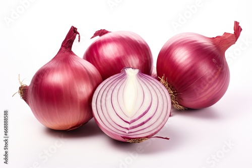 Fresh whole and sliced red onion isolated on white background