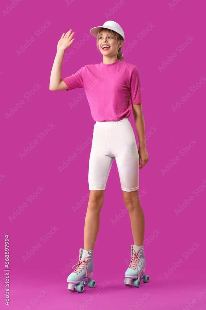 Young woman dressed as doll in roller skates on purple background Young woman dressed as doll in roller skates on purple background