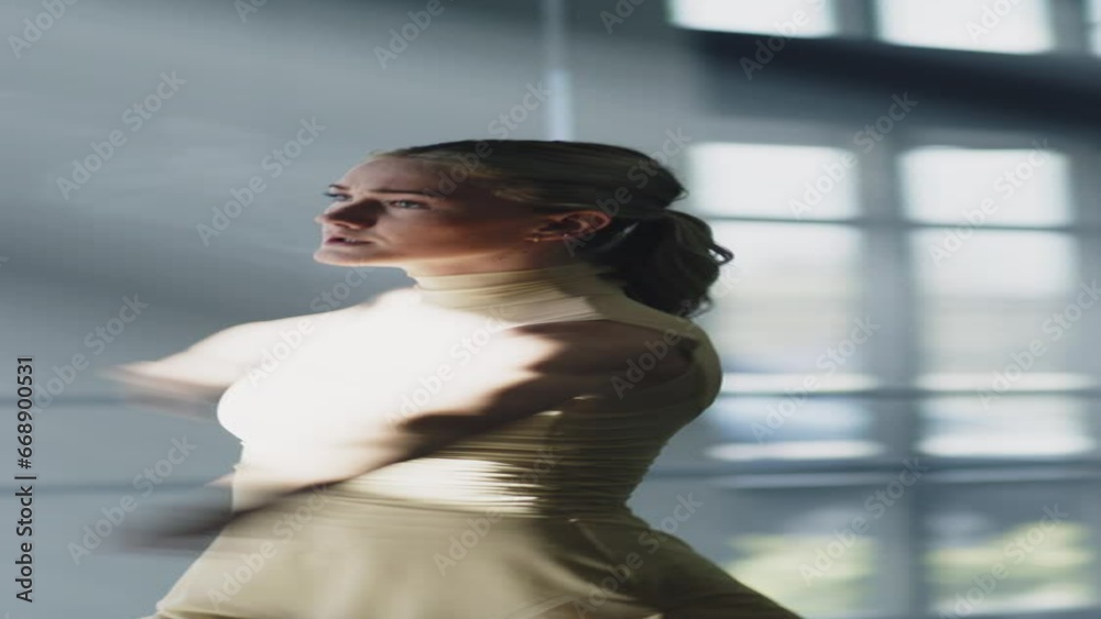 Woman practicing contemporary dancing in dance studio - vertical / Lehi, Utah, United States Woman practicing contemporary dancing in dance studio - vertical / Lehi, Utah, United States