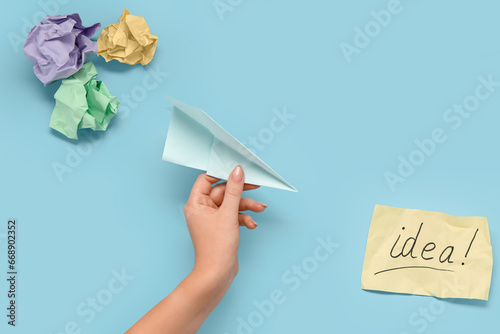Female hand with plane and ...