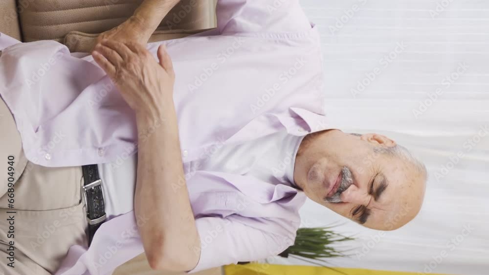 Vertical video of Old man with low back pain with hernia. Vertical video of Old man with low back pain with hernia.