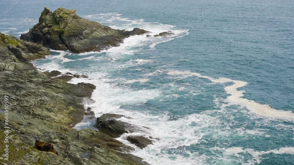 Stormy Waters And Crashing Waves On A Dramatic Rocky Coastline Stormy Waters And Crashing Waves On A Dramatic Rocky Coastline