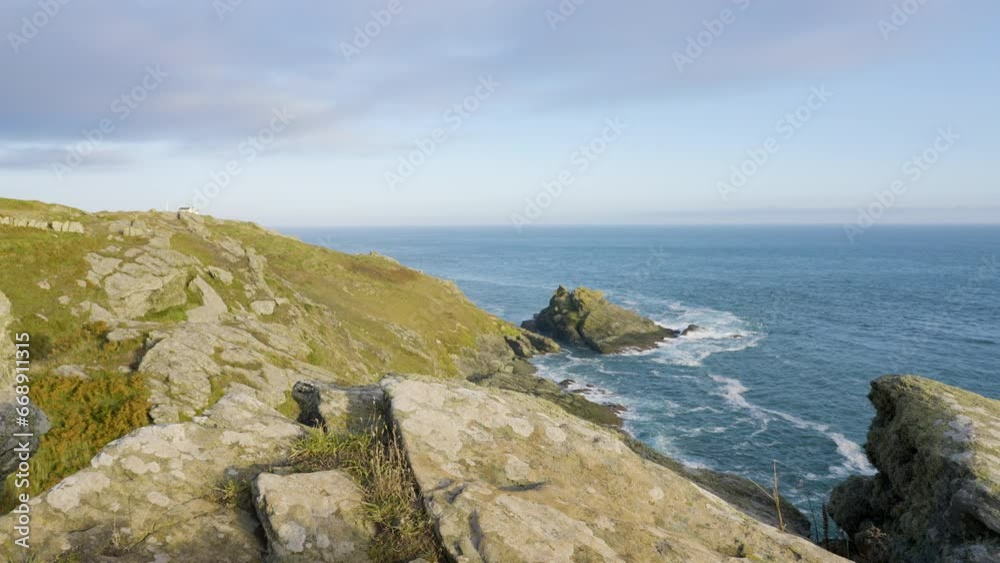 View Over Coastal Cliff Along Beautiful Rocky Coastline With Crashing Waves View Over Coastal Cliff Along Beautiful Rocky Coastline With Crashing Waves