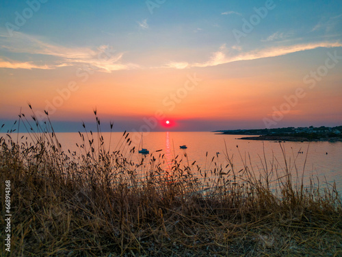 tramonto sul mare in estate - Salento  Puglia   Taranto  Italia