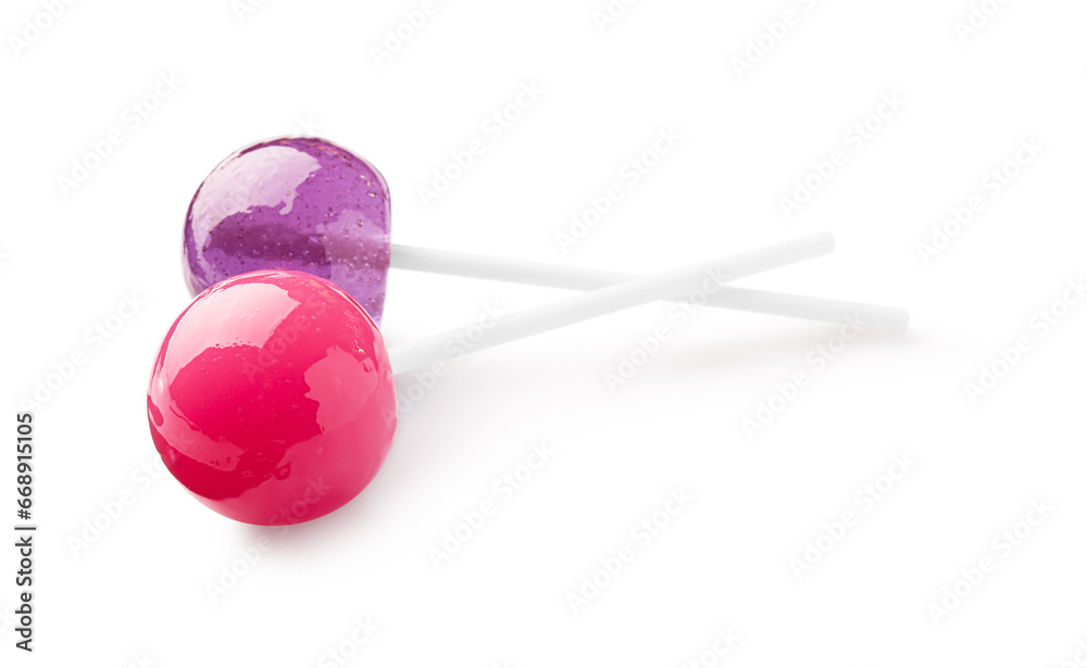 Two sweet colorful lollipops isolated on white Two sweet colorful lollipops isolated on white
