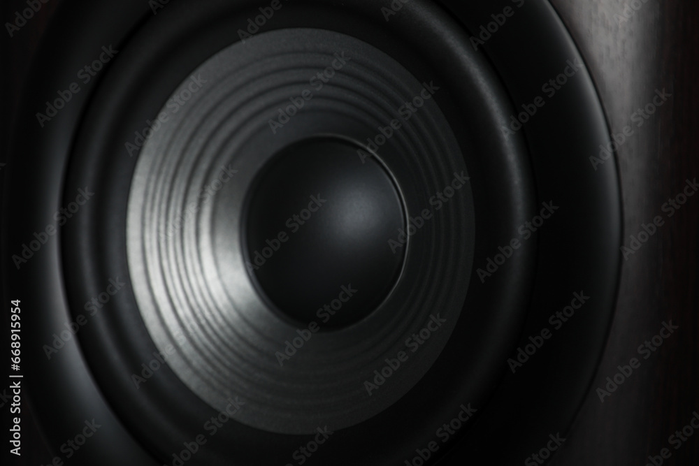 One modern sound speaker as background, closeup