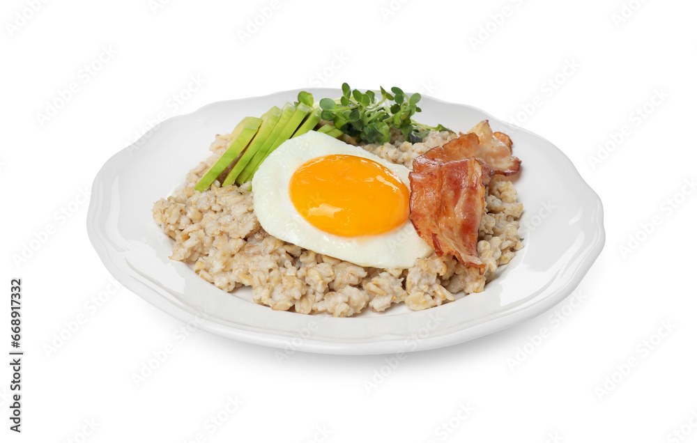 Tasty boiled oatmeal with fried egg, avocado and bacon isolated on white Tasty boiled oatmeal with fried egg, avocado and bacon isolated on white
