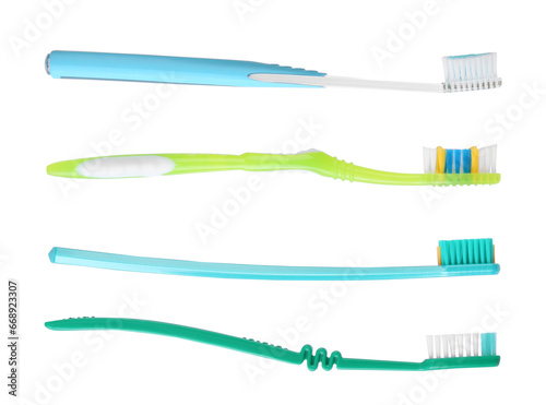 Set of different colorful toothbrushes on white background