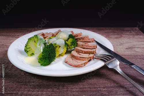 gourmet food plates presentation on black background