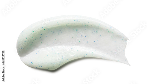 Face scrub smear swatch isolated on white. Exfoliating skincare product smudge. White creamy cleanser with blue particles closeup photo