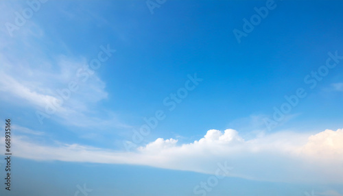 blue sky background and white clouds soft focus and copy space horizontal shape