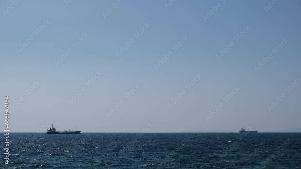 Beautiful scene of ships sailing in sea near Marina City, Kuroshioichiba, Japan.