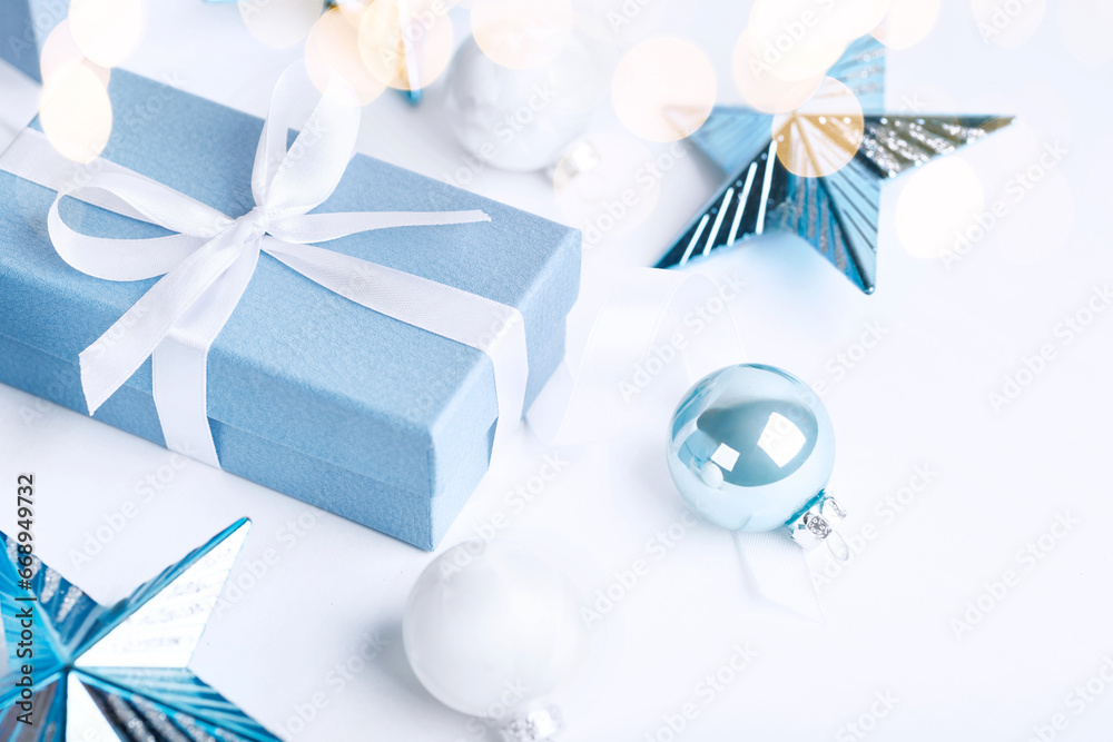 Christmas blue gifts with decorations on white background Christmas blue gifts with decorations on white background
