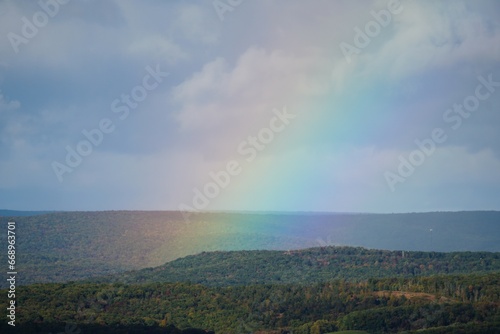 A rainbow formed near the Hawk Mountain  Hamburg  Pennsylvania  U.S