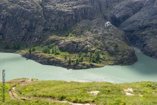 View of the Margaritze Reservoir underneath the Grossglockner Mountain. Austria photo
