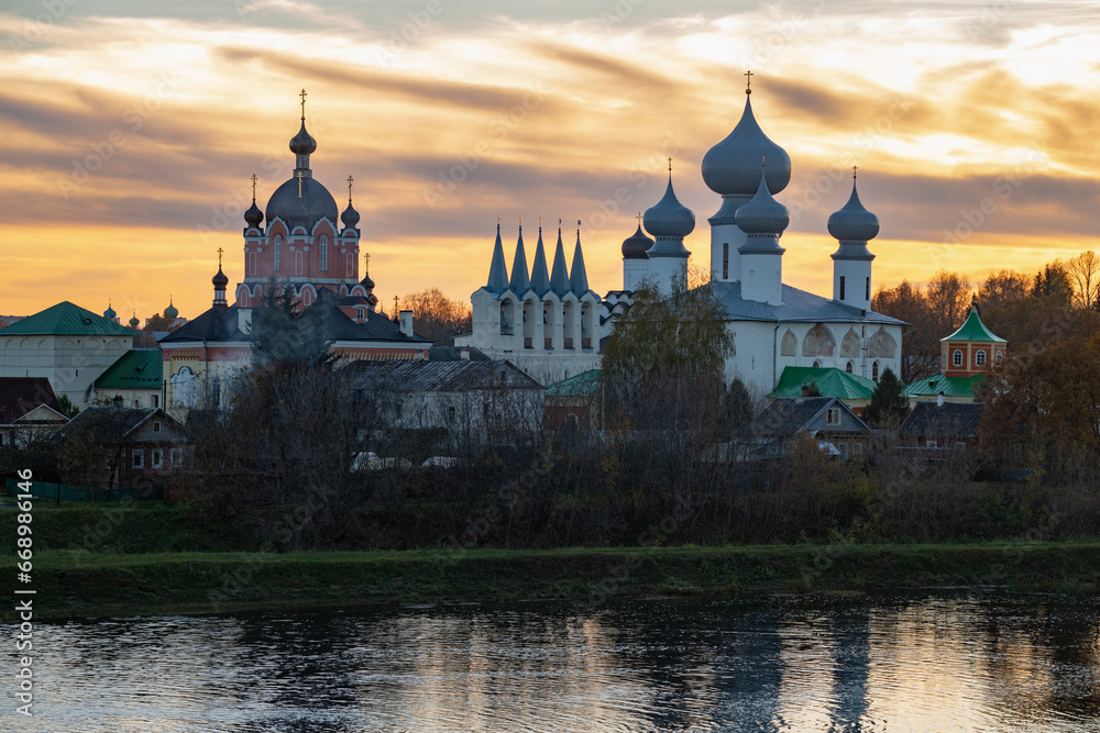 The ancient Tikhvinsky Assumption Monastery in October sunset. Leningrad Oblast, Russia