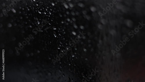 Raindrops On Glass is motion footage for documentary films and cinematic in nature scene. Also good background for scene and titles.