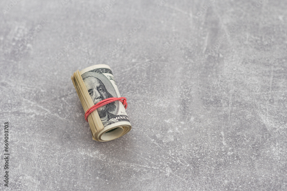 money roll pounds isolated on white background,cash money bills rolled up with rubber bands. money roll pounds isolated on white background,cash money bills rolled up with rubber bands.