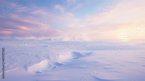 A pristine snow-covered landscape, the untouched white expanse reflecting the soft light of dawn.