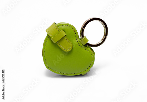  Green leather trinket isolated on white background.