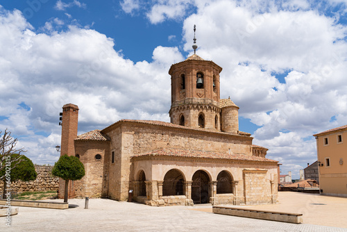 Romanesque church of San Miguel in the main square of Almazan in Soria. Spain. photo