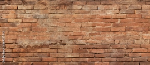 Ornate design on aged brick wall